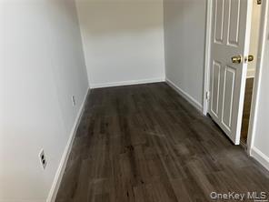 90 Murray Hill Street Elmont, NY 11003 - Photo 6 of 6 a view of a hallway