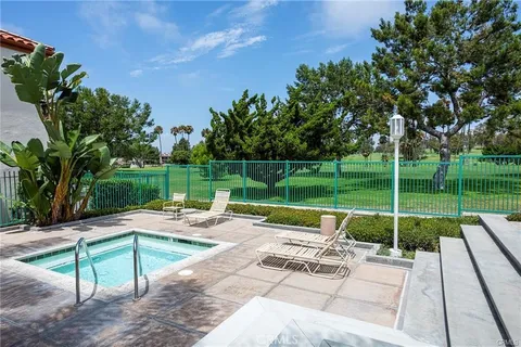 a view of swimming pool with a patio