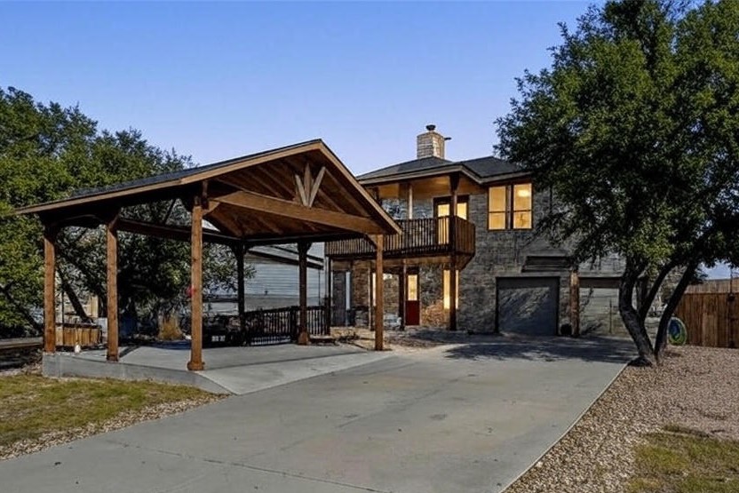 19004 Mariners Point Point Venture, TX 78645 - Photo 1 of 23 Spacious Point Venture home with covered parking, 2 car garage and side lot parking for your RV, boat and lake toys.