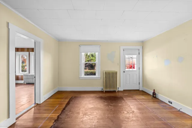 an empty room with windows