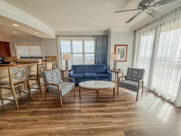 a living room with furniture and a window