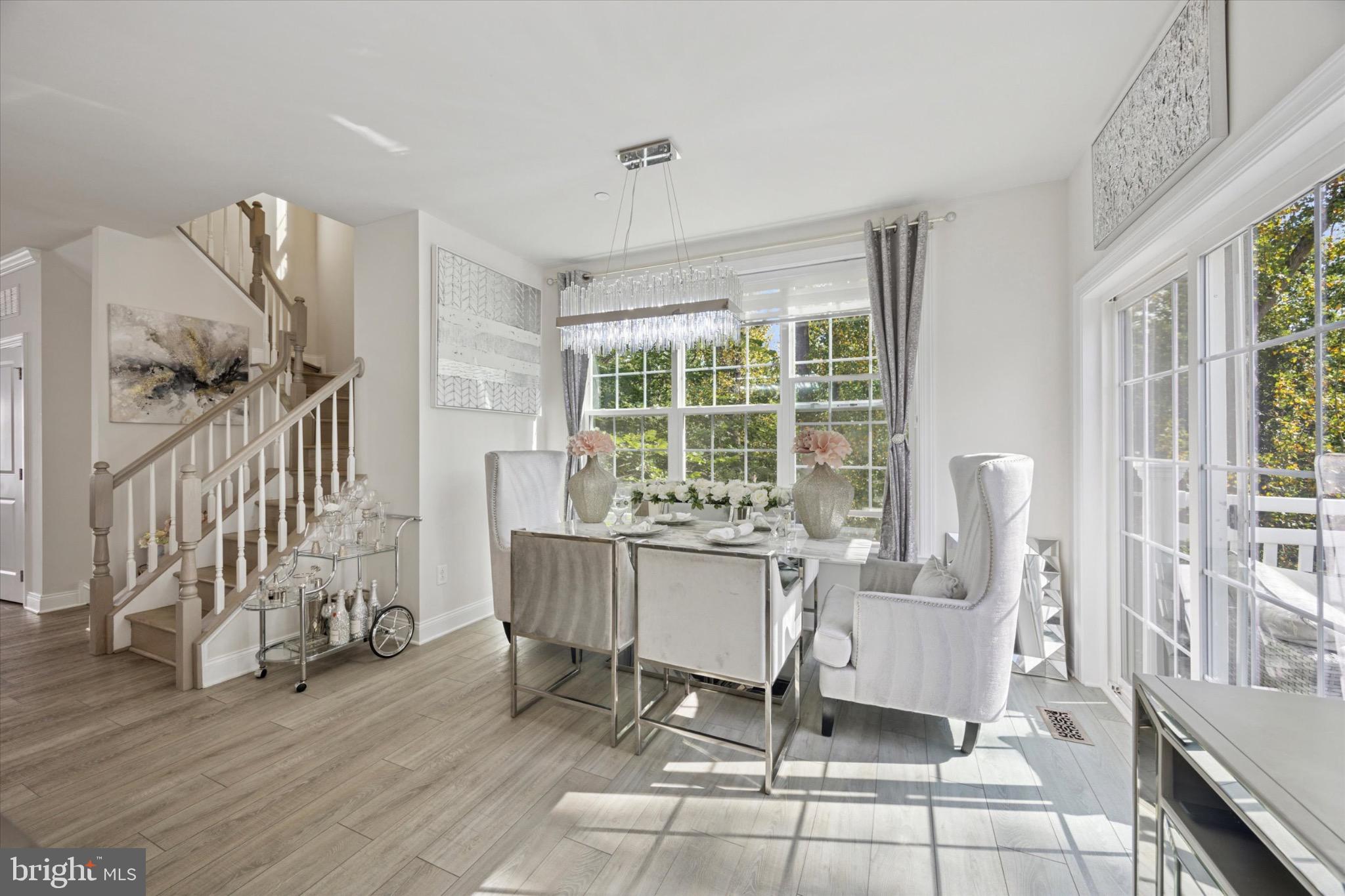 213 Corvus Circle Media, PA 19063 - Photo 11 of 34 a living room with fireplace furniture and a large window