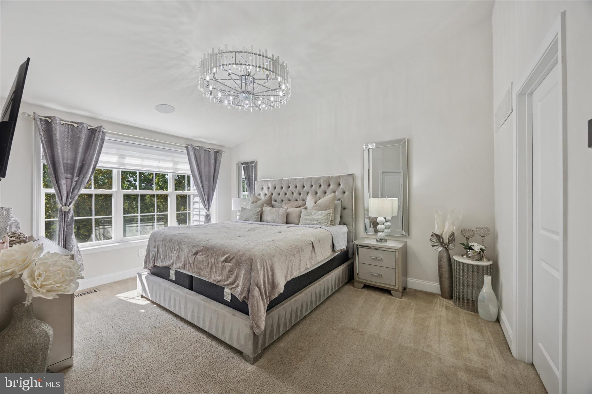 213 Corvus Circle Media, PA 19063 - Photo 15 of 34 a spacious bedroom with a bed and a window