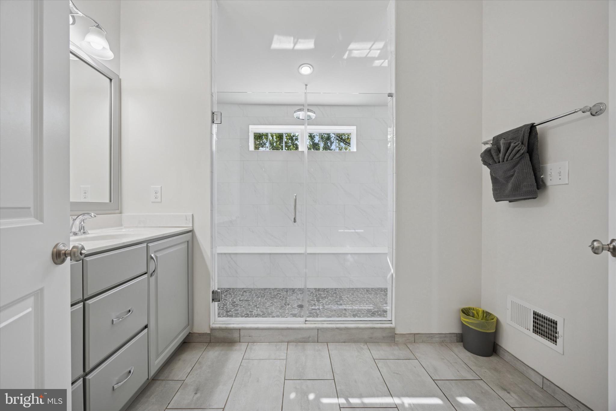 213 Corvus Circle Media, PA 19063 - Photo 17 of 34 a bathroom with a bathtub and a shower