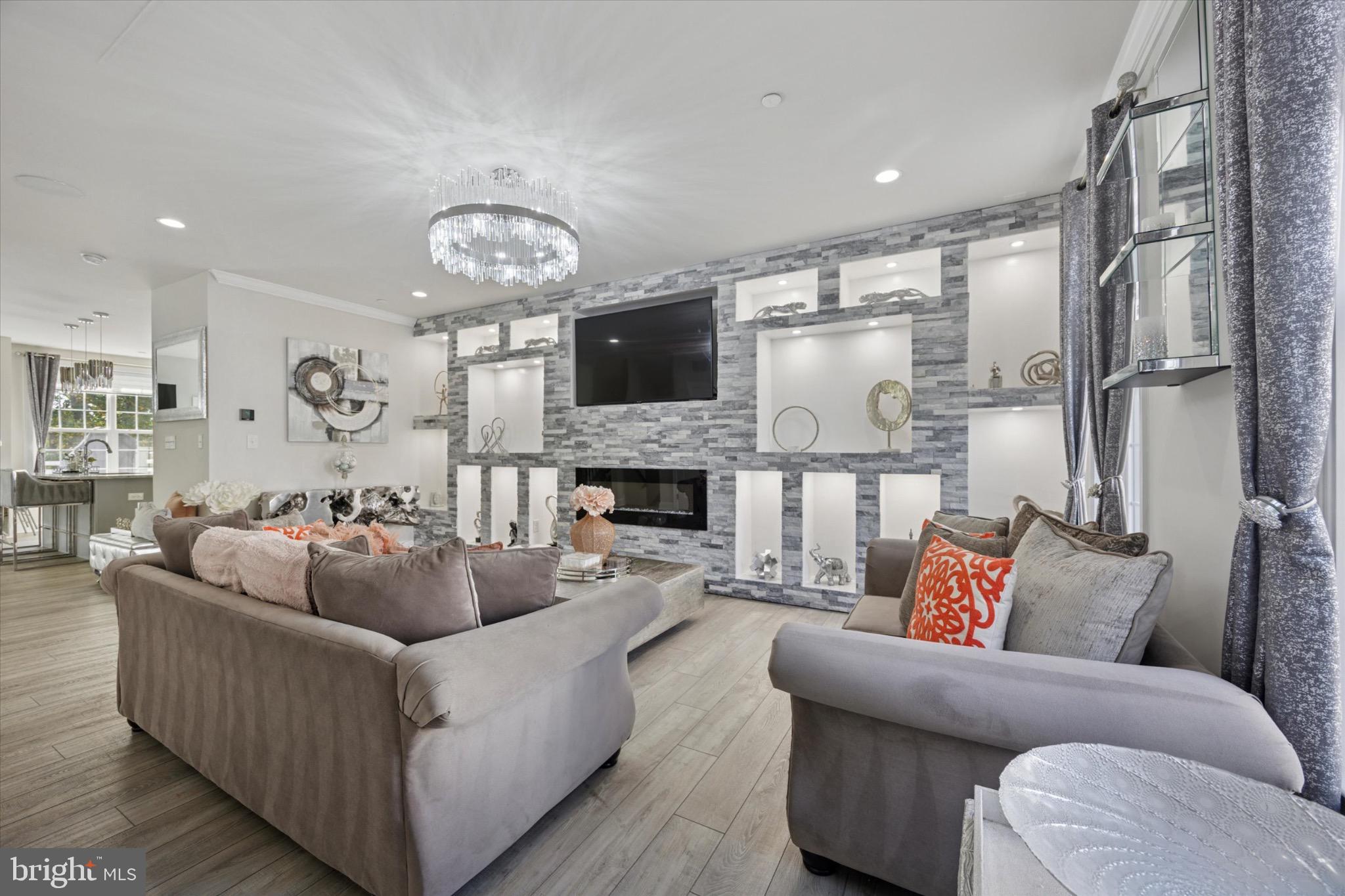 213 Corvus Circle Media, PA 19063 - Photo 2 of 34 a living room with furniture fireplace and a flat screen tv