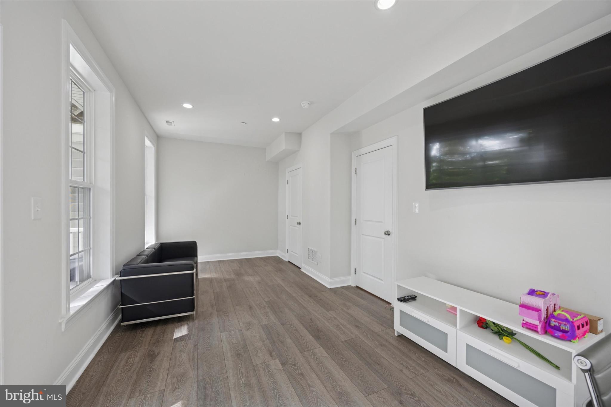 213 Corvus Circle Media, PA 19063 - Photo 27 of 34 a room with furniture and a flat screen tv