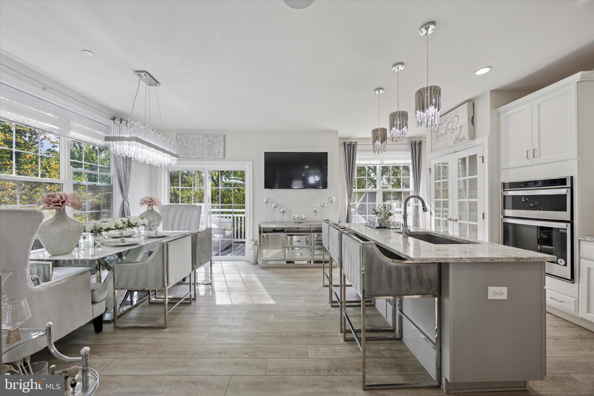 213 Corvus Circle Media, PA 19063 - Photo 9 of 34 a view of a dining room with furniture window and wooden floor