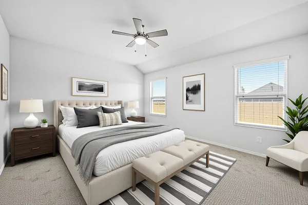 a bedroom with bed and a window