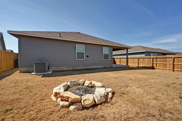 a house view with a backyard
