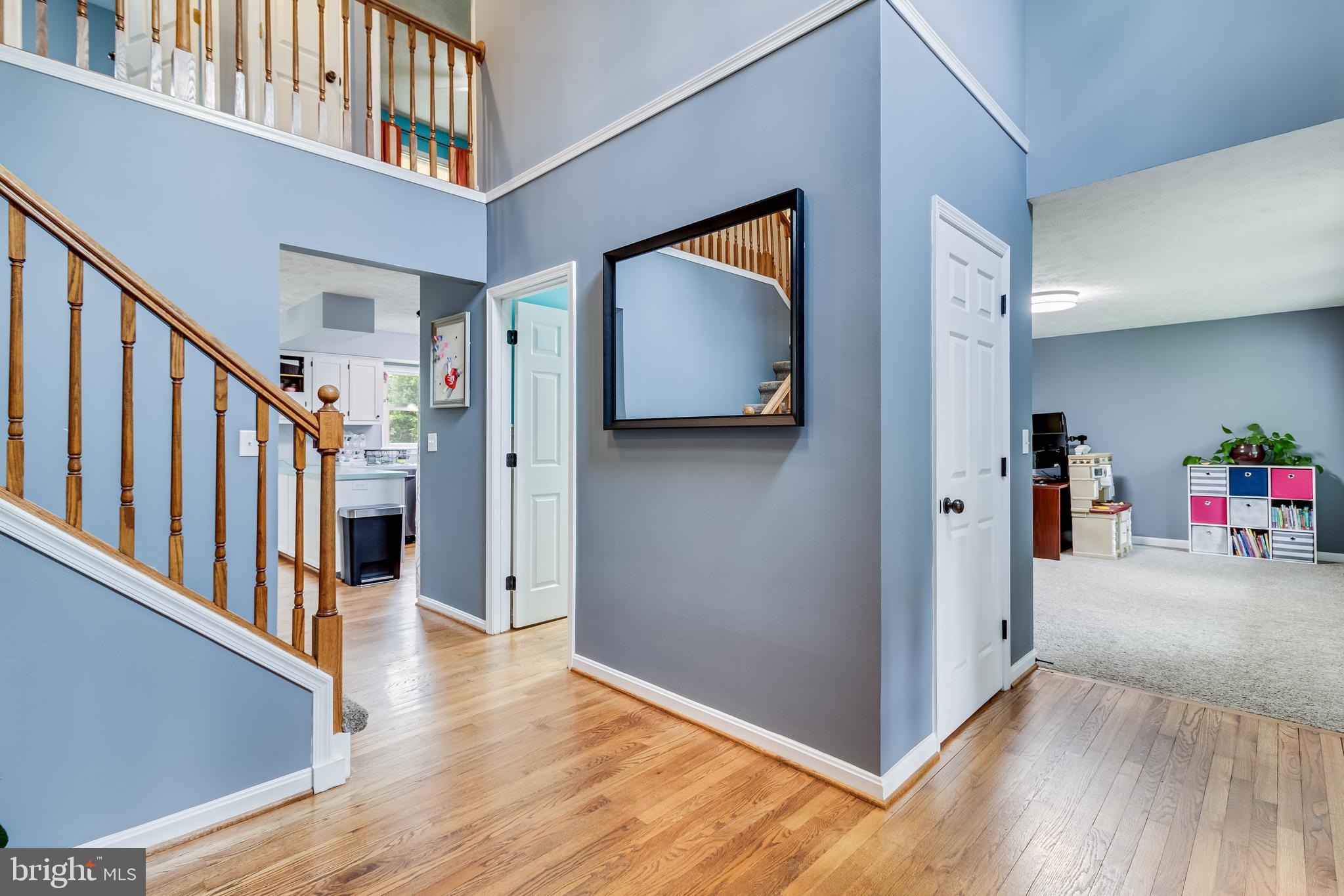 20919 Ridge Path Way Leonardtown, MD 20650 - Photo 12 of 56 a view of a hallway view with staircase and kitchen view