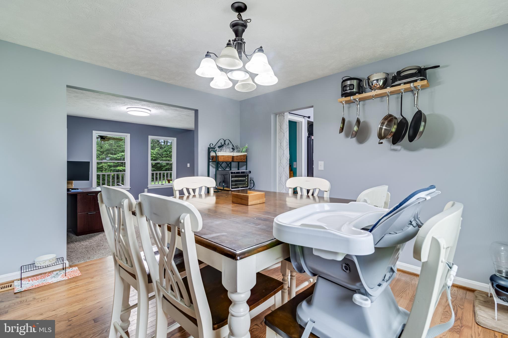 20919 Ridge Path Way Leonardtown, MD 20650 - Photo 28 of 56 a view of a dining room with furniture window and wooden floor