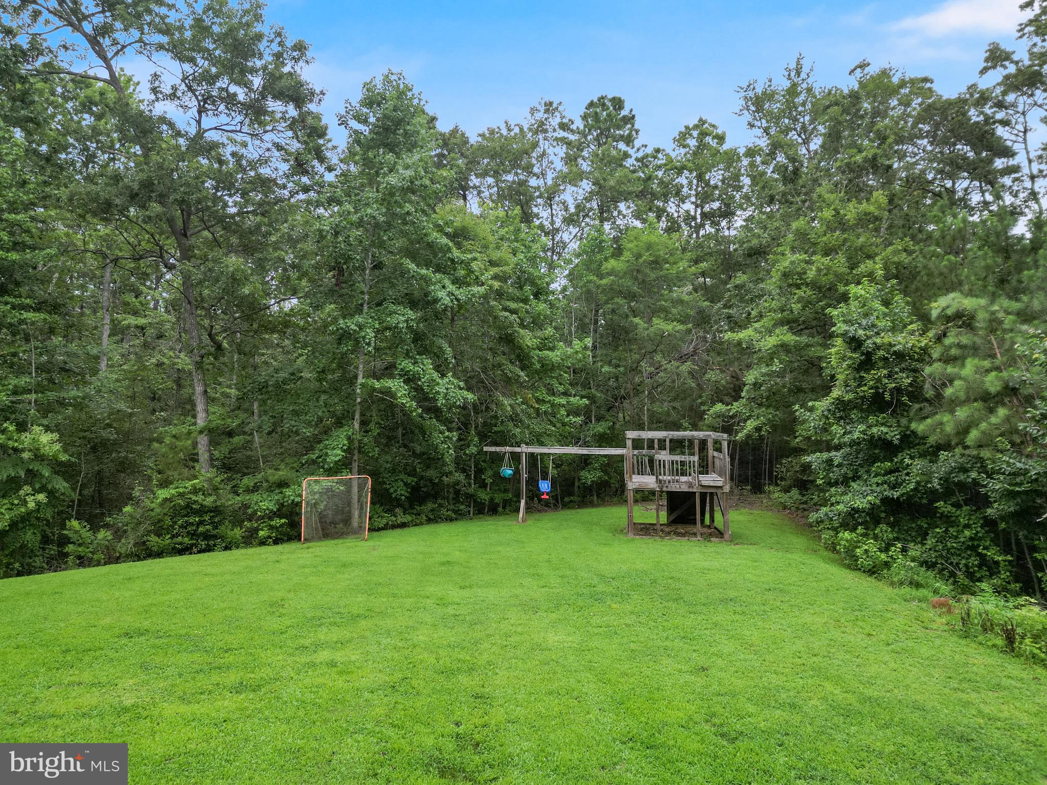 20919 Ridge Path Way Leonardtown, MD 20650 - Photo 34 of 56 a view of a green field with wooden fence