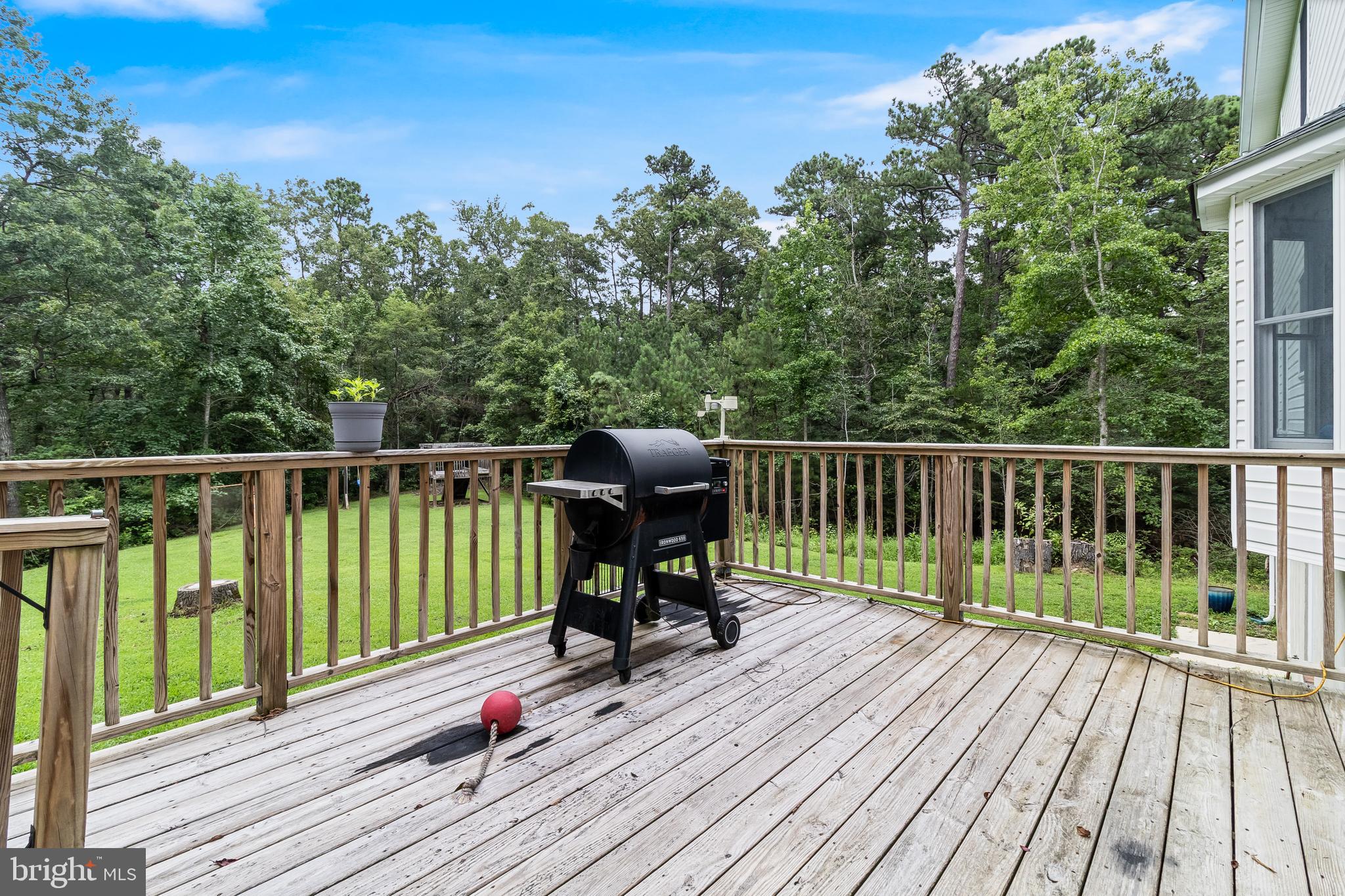 20919 Ridge Path Way Leonardtown, MD 20650 - Photo 42 of 56 a view of a deck with wooden floor and fence with a large garden