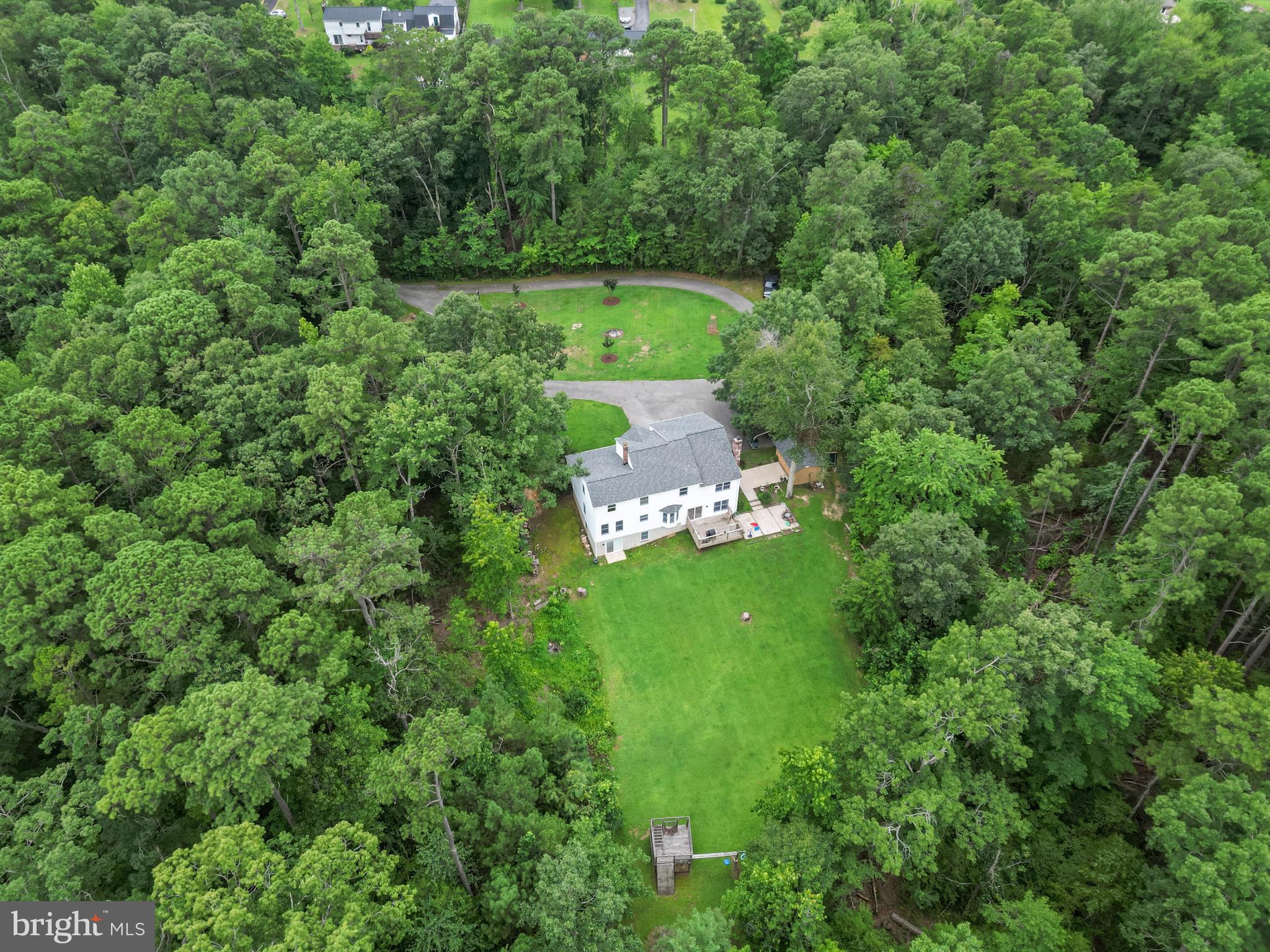 20919 Ridge Path Way Leonardtown, MD 20650 - Photo 49 of 56 an aerial view of a house with a yard