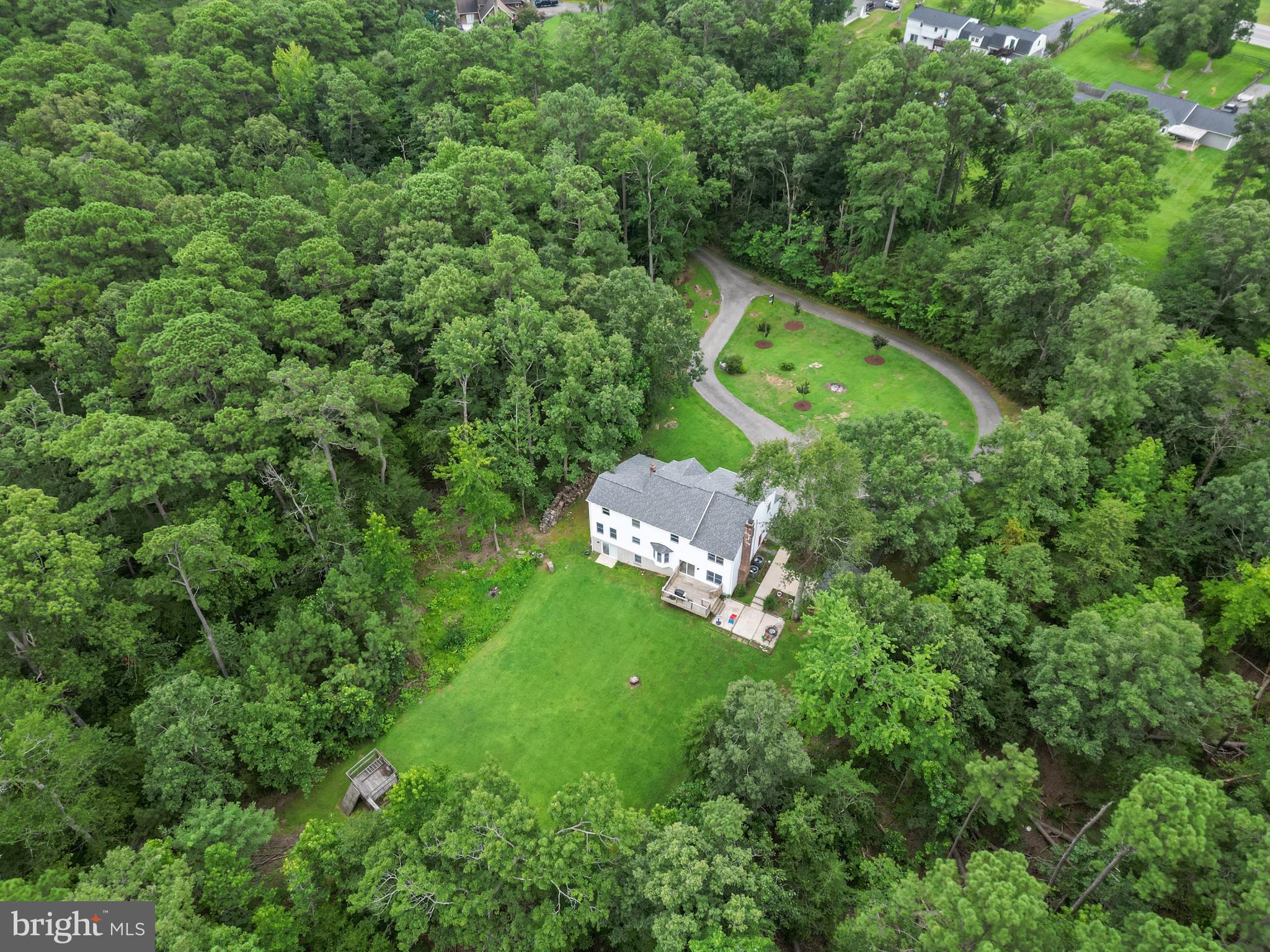 20919 Ridge Path Way Leonardtown, MD 20650 - Photo 50 of 56 an aerial view of a house with a yard