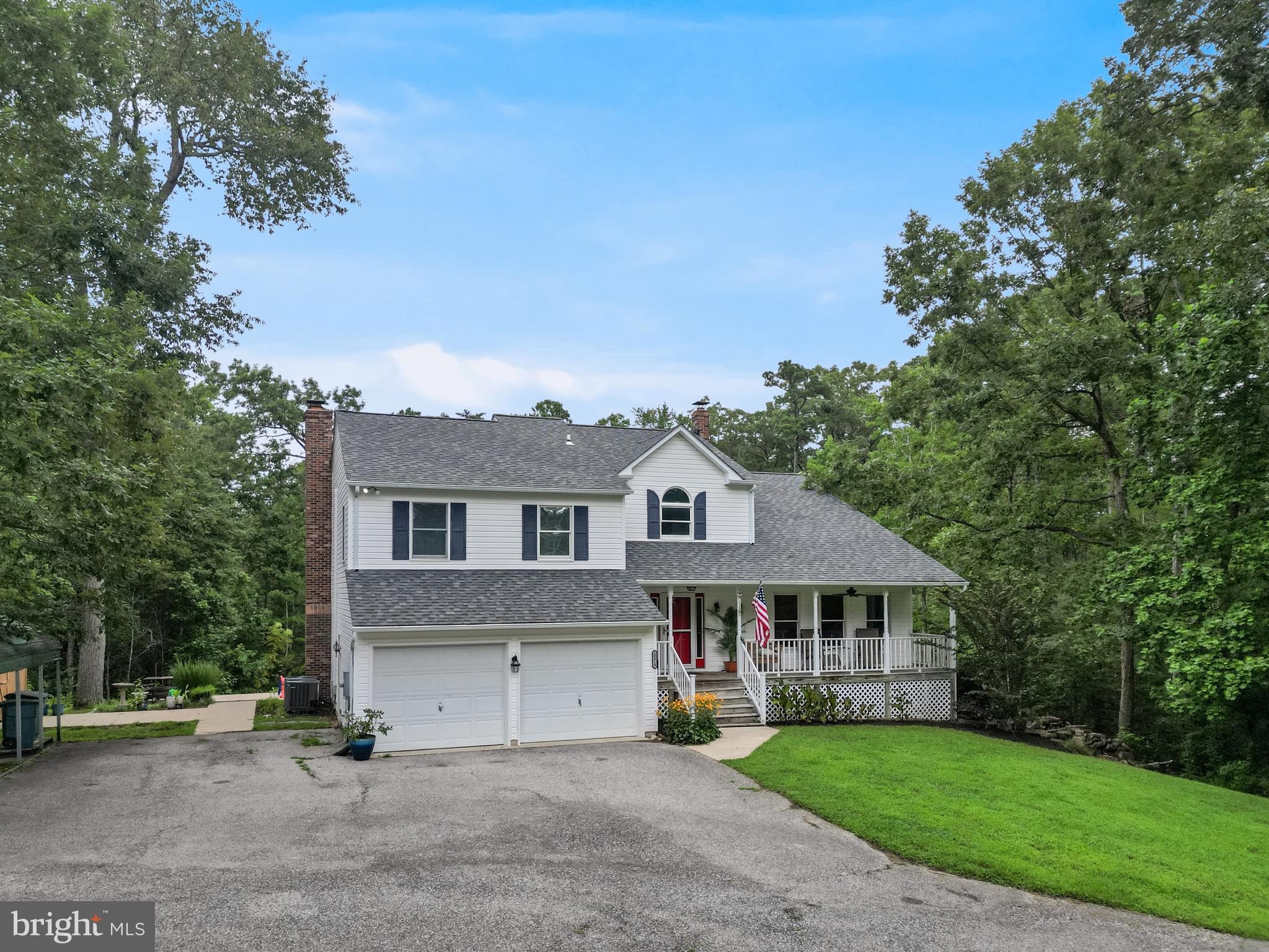 20919 Ridge Path Way Leonardtown, MD 20650 - Photo 52 of 56 front view of a house with a yard