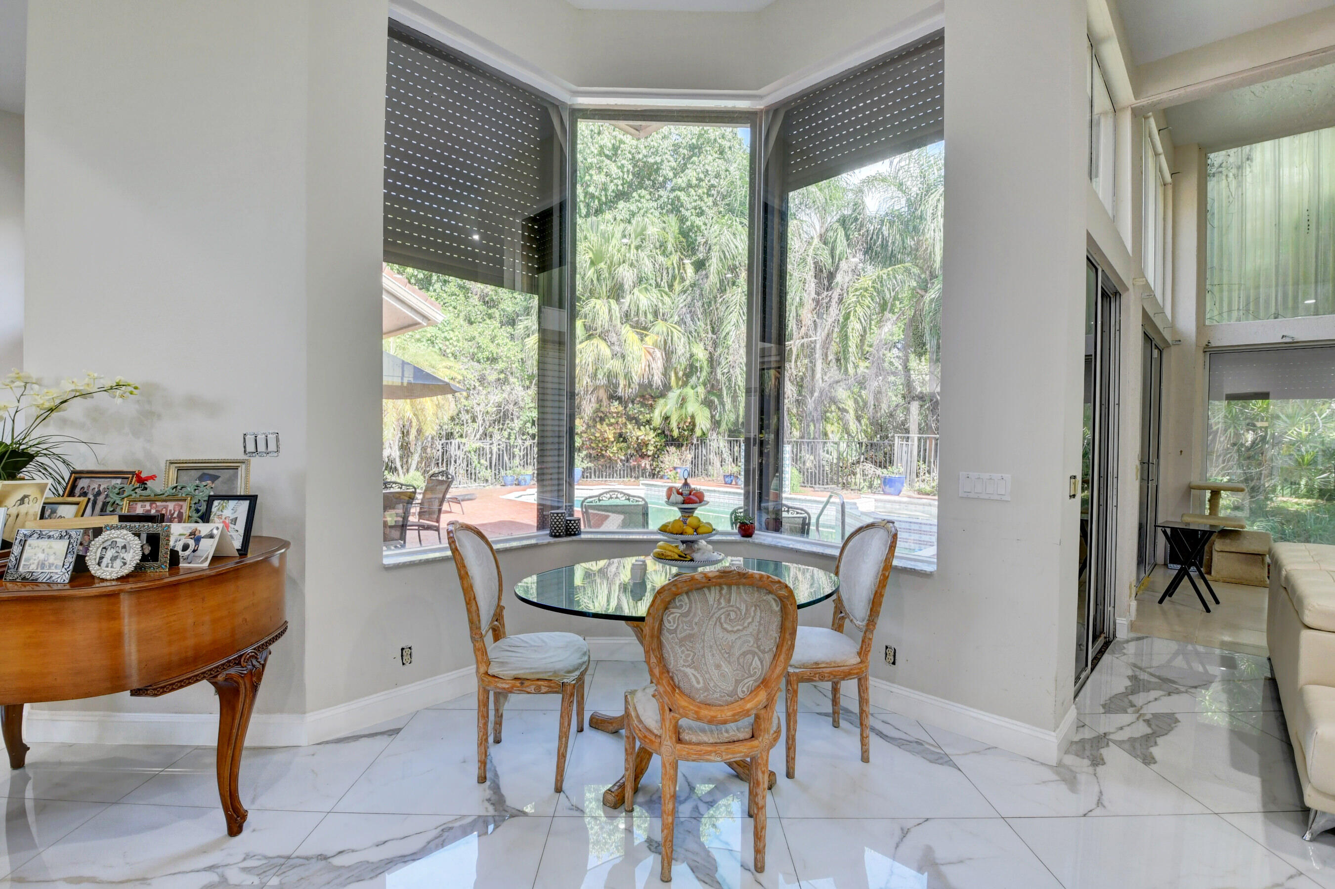 4701 Pine Tree Drive Boynton Beach, FL 33436 - Photo 15 of 35 4701 Breakfast room to pool