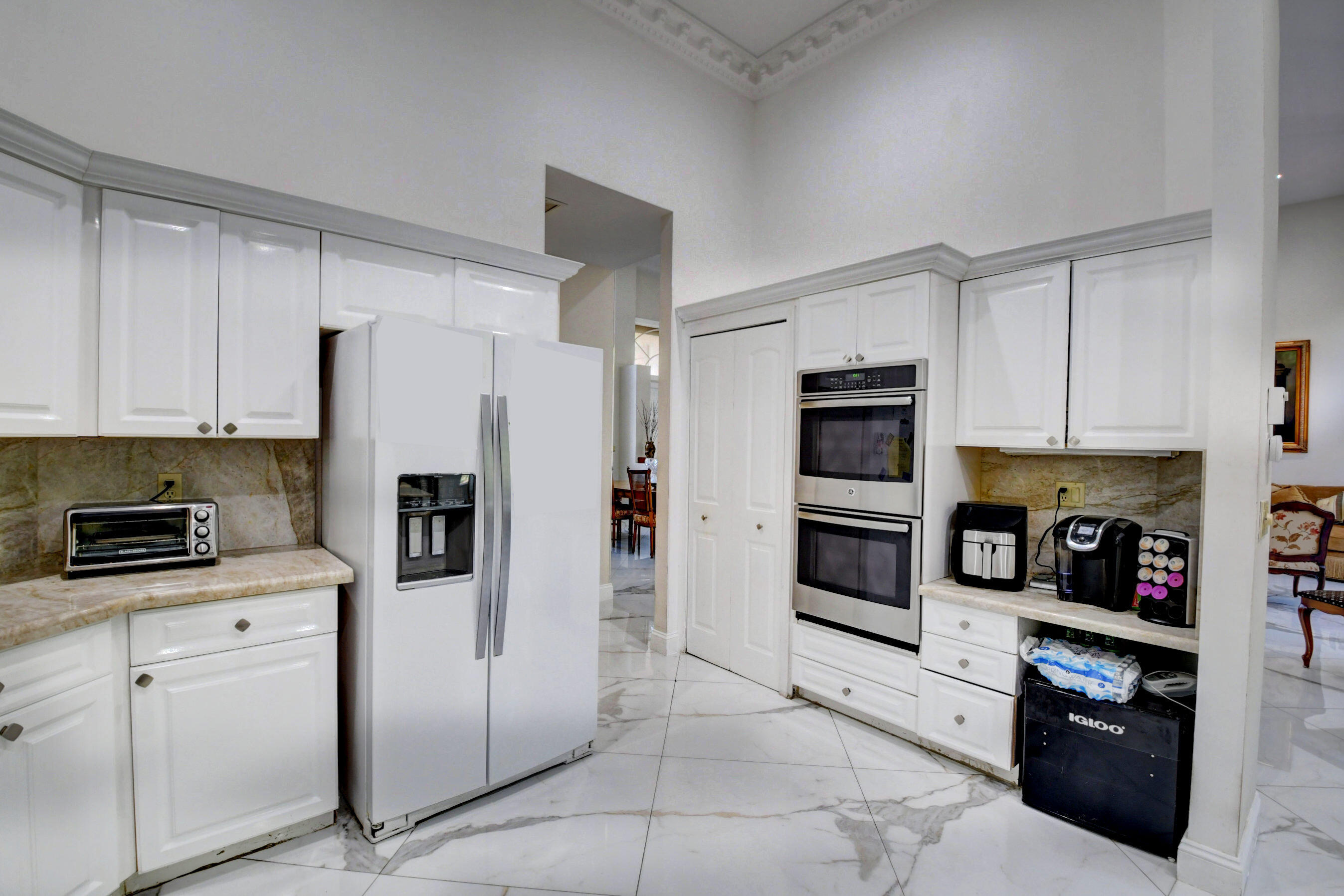 4701 Pine Tree Drive Boynton Beach, FL 33436 - Photo 21 of 35 4701 kitchen to ovens