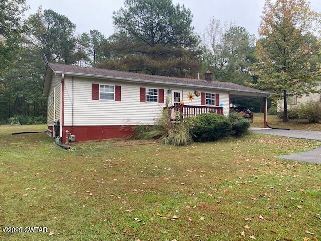 1885 Blue Goose Road Huron, TN 38345 - Photo 29 of 31 a front view of a house with garden