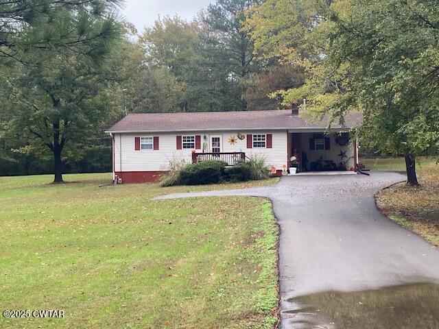 1885 Blue Goose Road Huron, TN 38345 - Photo 30 of 31 a front view of house with yard and green space