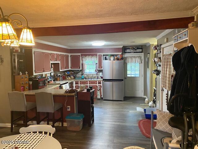 1885 Blue Goose Road Huron, TN 38345 - Photo 4 of 31 a open kitchen with stainless steel appliances granite countertop a refrigerator dining table and chairs