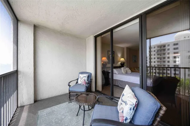 a view of a livingroom with furniture and a dining room