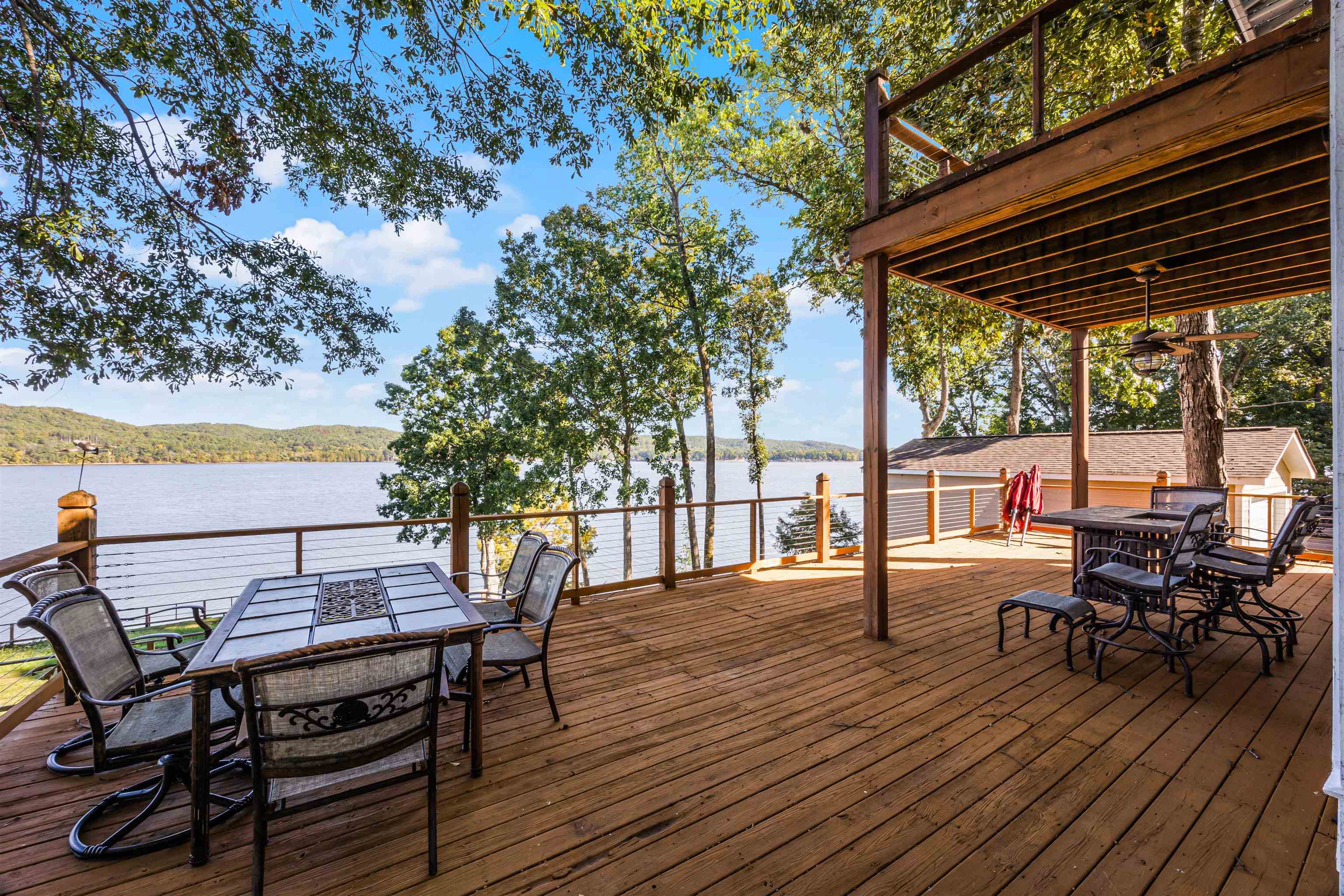 830 Big Bear Creek Road Cherokee, MS 35616 - Photo 19 of 39 Deck featuring an outdoor fire pit and a water and mountain view