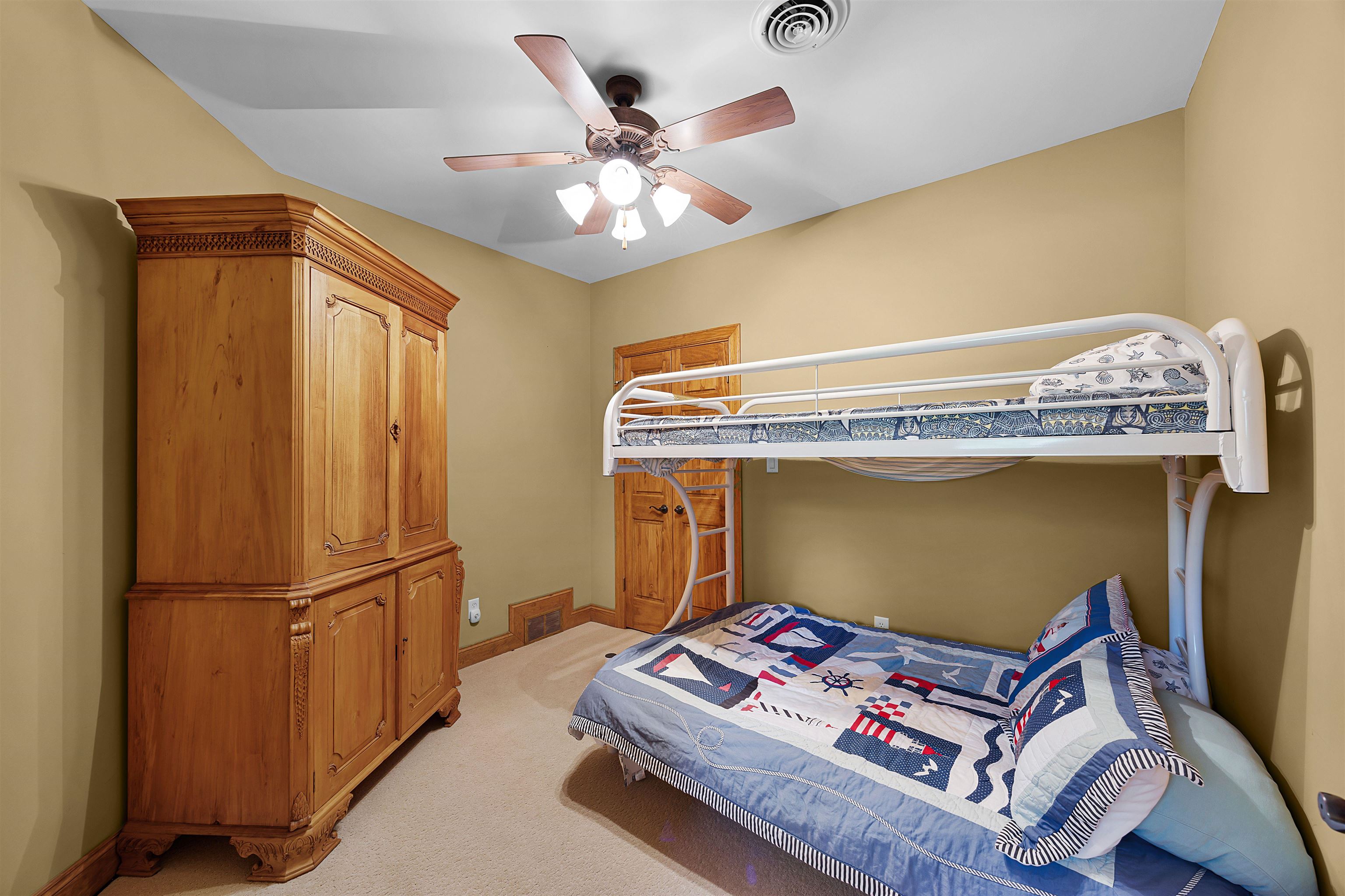 830 Big Bear Creek Road Cherokee, MS 35616 - Photo 2 of 39 Bedroom with ceiling fan and light carpet