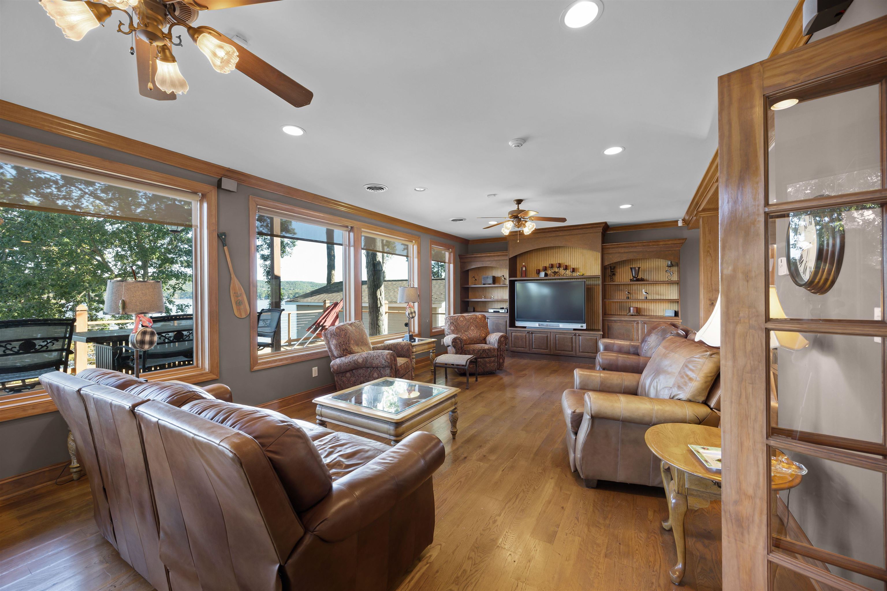 830 Big Bear Creek Road Cherokee, MS 35616 - Photo 23 of 39 Living room with light hardwood / wood-style floors, ornamental molding, and ceiling fan