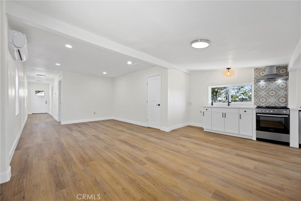 102 Jackson Street Taft, CA 93268 - Photo 12 of 34 a view of a kitchen with a sink and a stove top oven