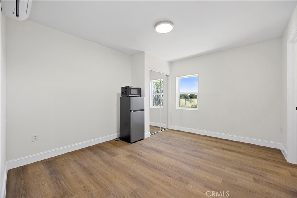 102 Jackson Street Taft, CA 93268 - Photo 18 of 34 a view of an empty room with closet and a window