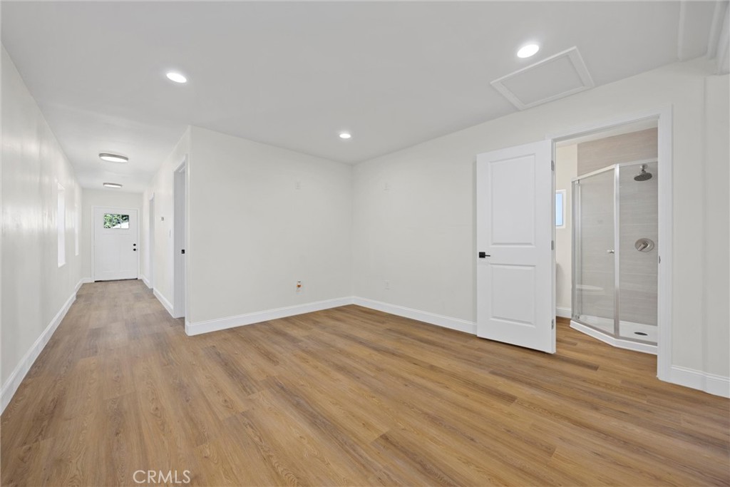 102 Jackson Street Taft, CA 93268 - Photo 21 of 34 wooden floor in an empty room