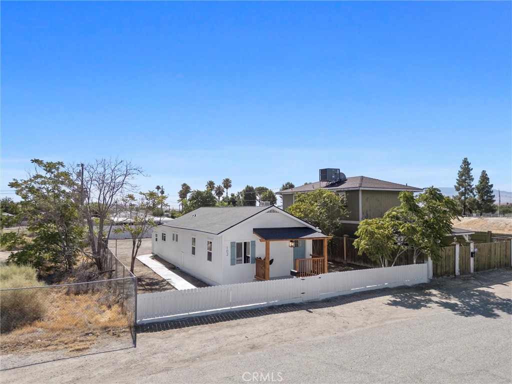102 Jackson Street Taft, CA 93268 - Photo 30 of 34 a view of a house with a outdoor space