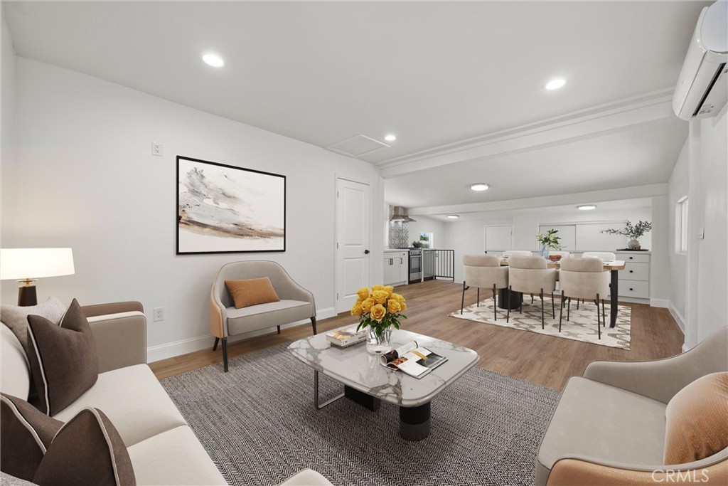 102 Jackson Street Taft, CA 93268 - Photo 4 of 34 a living room with furniture and wooden floor