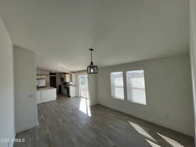 a view of a kitchen with a sink and dishwasher