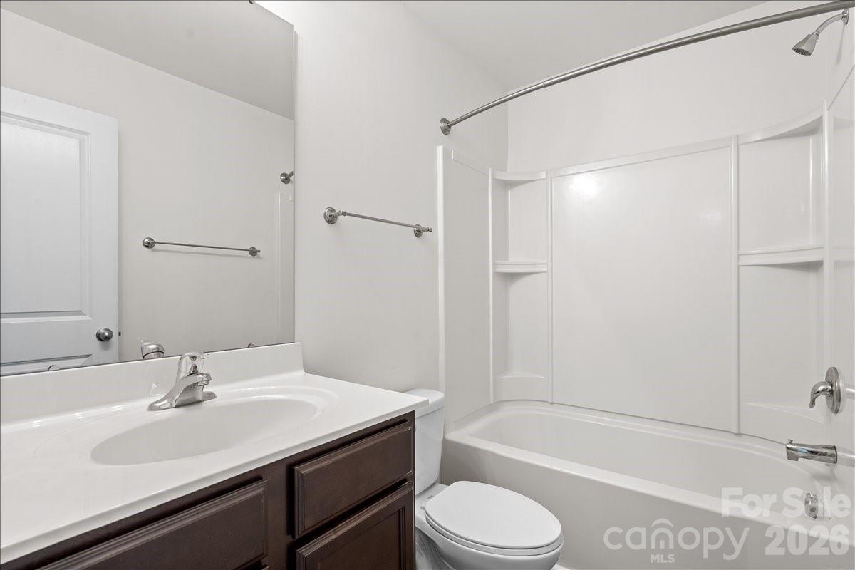 6066 Benedict Place, Unit 32 Fort Mill, SC 29707 - Photo 15 of 32 a bathroom with a sink toilet and shower