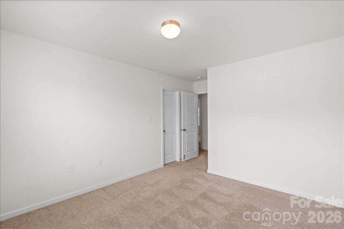 6066 Benedict Place, Unit 32 Fort Mill, SC 29707 - Photo 22 of 32 a view of an empty room
