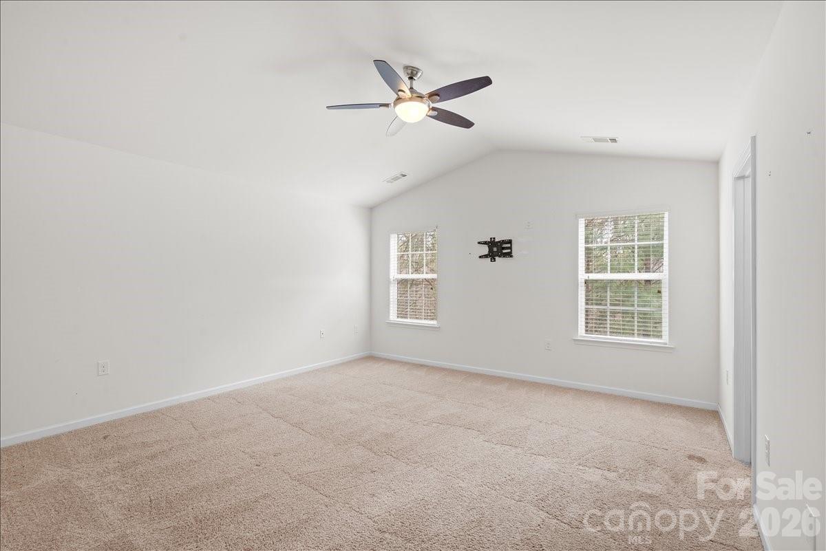 6066 Benedict Place, Unit 32 Fort Mill, SC 29707 - Photo 28 of 32 a view of an empty room with a window