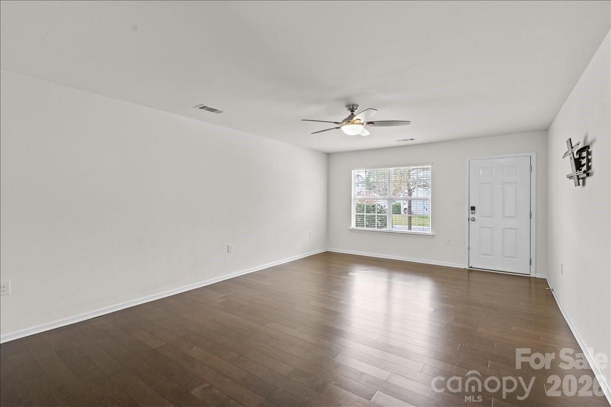 6066 Benedict Place, Unit 32 Fort Mill, SC 29707 - Photo 5 of 32 a view of an empty room with a window