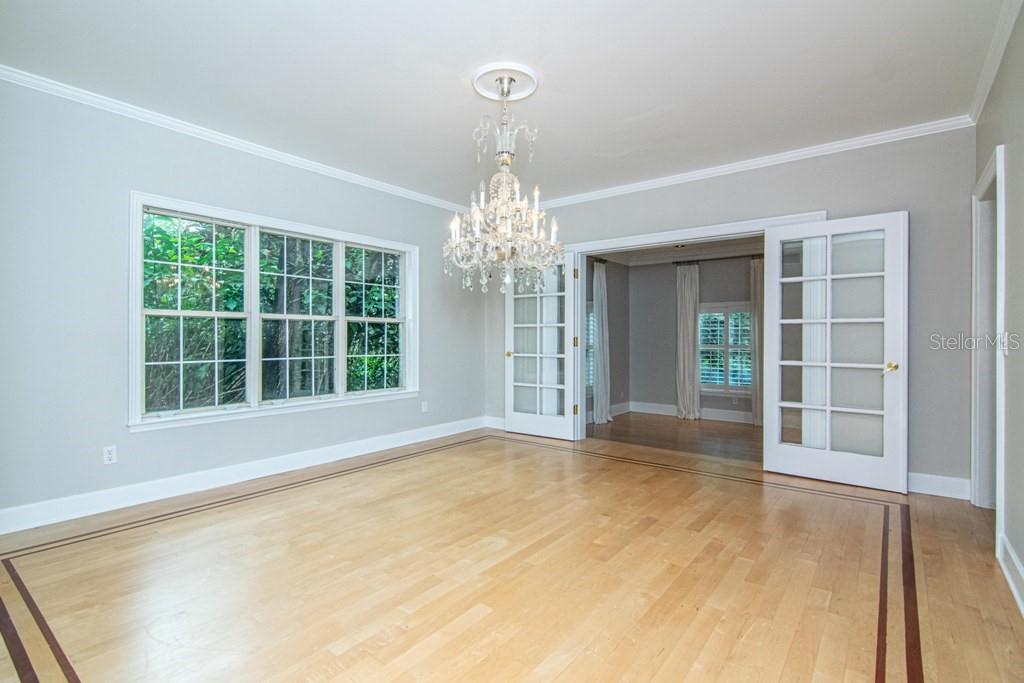 16405 Avila Boulevard Tampa, FL 33613 - Photo 16 of 61 a view of an empty room with a window