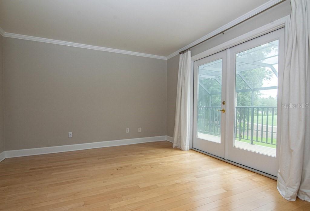 16405 Avila Boulevard Tampa, FL 33613 - Photo 27 of 61 a view of an empty room with a window