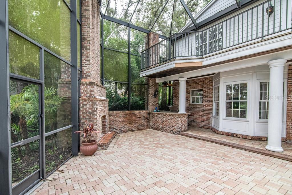16405 Avila Boulevard Tampa, FL 33613 - Photo 46 of 61 a view of a house with a large window and brick walls