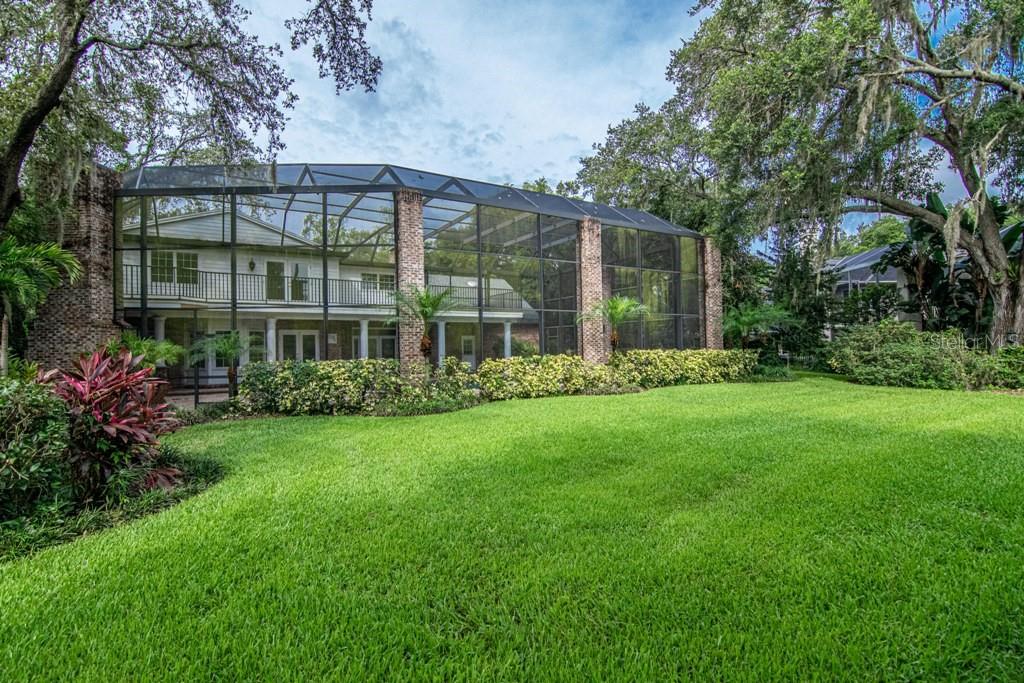 16405 Avila Boulevard Tampa, FL 33613 - Photo 56 of 61 a view of a house with garden and a garden