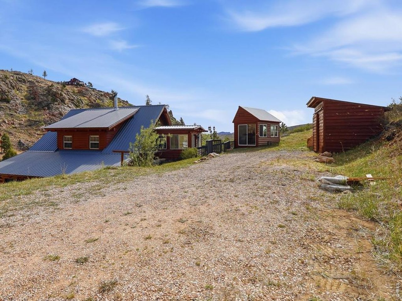 1652 Eiger Road Livermore, CO 80536 - Photo 36 of 50 Pull into your Home surrounded by views, as well as your Sunlit Hobby House, and Wood Shed