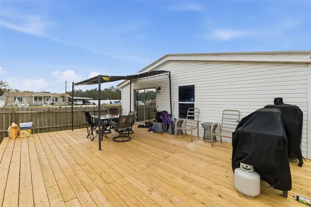 a view of a house with a big yard