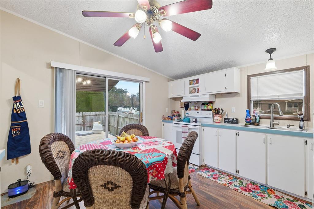 1890 Derosa Road Polk City, FL 33868 - Photo 8 of 20 a bedroom with furniture and a window