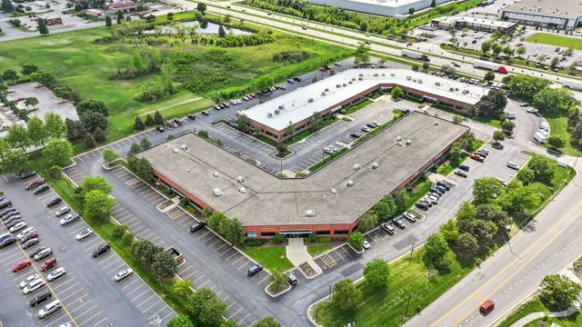 a view of a city with a lake