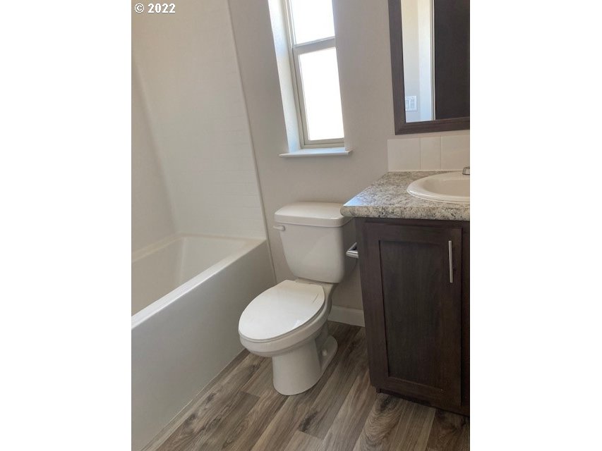 3104 Southwest Terrace Drive Pendleton, OR 97801 - Photo 18 of 18 a bathroom with a toilet and a sink