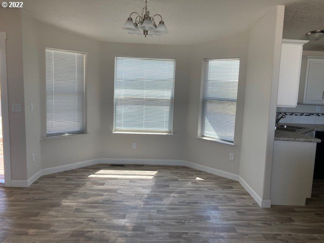 3104 Southwest Terrace Drive Pendleton, OR 97801 - Photo 3 of 18 a view of empty room with wooden floor and fan