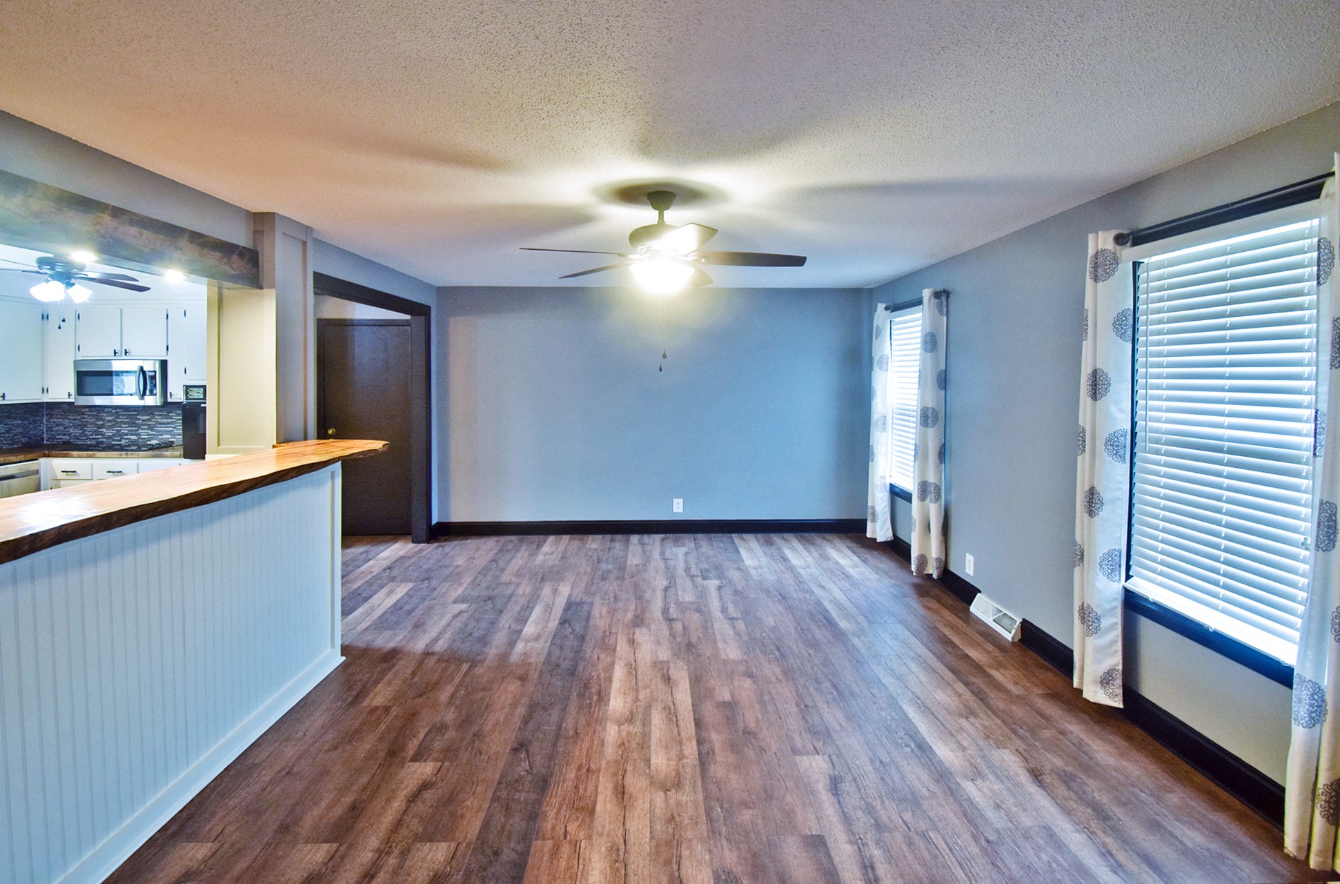 710 Dean Road Clarksville, TN 37040 - Photo 4 of 17 a view of a kitchen with wooden floor and a window